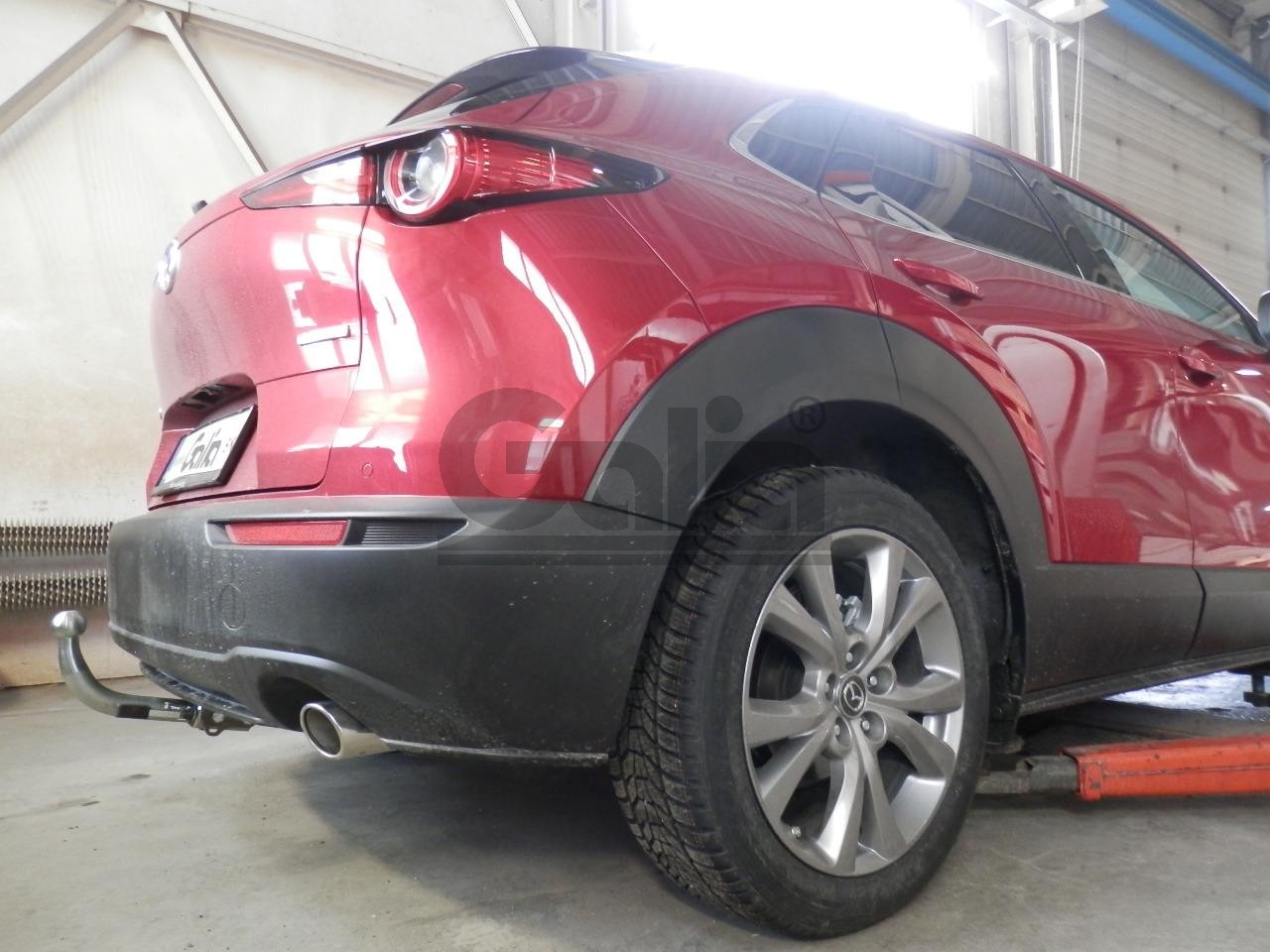 Полностью оцинкованный фаркоп на Mazda CX-30 2019-. Тип шара: C (горизонтальный съемный). Невидимый вырез бампера. Нагрузки: 1600/80 кг, масса фаркопа 16,87 кг